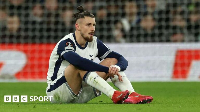 Radu Dragusin sat on the pitch while playing for Tottenham